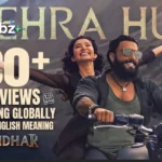 Gehra Hua Lyrics with English Meaning | Dhurandhar (2026) Gehra Hua Lyrics from Dhurandhar have captivated music lovers with their heartfelt words, emotional depth, and memorable melody. Fans across the globe search for Gehra Hua Lyrics to sing along, understand the song's meaning, and explore its English translation. Whether you're looking for the complete lyrics, a line-by-line interpretation, or details about the song and its artists, this guide has everything you need. The growing popularity of Gehra Hua Lyrics reflects the song's emotional impact and beautiful storytelling. At OkyVibz.com, we bring you a complete guide featuring Gehra Hua Lyrics, song details, English meaning, and the latest updates to help you appreciate every verse of this beautiful track in 2026. Detail About Gehra Hua Lyrics Gehra Hua is a romantic melody from the soundtrack of Dhurandhar, the 2025 Indian spy thriller directed by Aditya Dhar. The film stars Ranveer Singh, Sanjay Dutt, Akshaye Khanna, R. Madhavan, Arjun Rampal, and Sara Arjun, and its music has drawn attention for blending intense action themes with tender love songs like this one. Here is a quick snapshot of the song details: Detail Information Song Title Gehra Hua Movie Dhurandhar Singers Arijit Singh, Armaan Khan Lyricist Irshad Kamil Music Composer Shashwat Sachdev Label Saregama Music Director (Music Video) Aditya Dhar Featured Cast Ranveer Singh, Sara Arjun Song Duration Around 6 minutes Language Hindi The Gehra Hua song was released as part of the Dhurandhar soundtrack in late 2025, ahead of the film's theatrical run. Composer Shashwat Sachdev, who is known for crafting emotionally rich background scores and melodies, gave this track a gentle, layered sound that lets Arijit Singh's voice carry most of the emotional weight, while Armaan Khan adds depth to the arrangement. Lyricist Irshad Kamil, celebrated for writing some of Bollywood's most poetic love songs, penned the words for this track. His writing style is known for turning simple emotions into vivid imagery, and this song follows that same tradition. The phrase gehra hua, which translates to deepened or grown deeper, sets the tone for a song about love that keeps intensifying with time. Fans searching for Dhurandhar lyrics 2026 or the Gehra Hua full song often want to understand the emotional context behind the words, not just the tune. That is exactly what makes this track special. It is not a fast, upbeat number. Instead, it is a slow-burning romantic ballad built around devotion, closeness, and the feeling of belonging completely to another person. Gehra Hua Lyrics Tu agar meri, yeh hawayein teri Tu agar meri, saari raahein teri Tu agar meri, main hoon tera Tu agar meri, yeh ujaale tere Tu agar meri, dil hawale tere Tu agar meri, main hoon tera Betaab-sa mohabbat ka tu inqalaab hai Mera jahaan teri baahon mein khwaab, khwaab hai Gehra hua, gehra hua Rang aashiqui gehra hua Gehra hua, gehra hua Dariya dua gehra hua Tera hua Tu agar meri, yeh hawayein teri Tu agar meri, saari raahein teri Tu agar meri, main hoon tera Palkein jhapakta hai aasmaan Laakhon farishton ki hai tu jaan Woh poochhte hain Rehti kahaan? Meri baahon mein rehti, unko bata Palkein jhapakta hai aasmaan Usne bhi tujh-sa dekha kahaan Hai raunakien wahan, tu hai jahaan Meri baahon mein rehna, yahi hai dua Tu agar meri, hai fasaana tera Tu agar meri, toh zamaana tera Tu agar meri, main hoon tera Betaab-sa mohabbat ka tu inqalaab hai Mera jahaan teri baahon mein khwaab, khwaab hai Gehra hua, gehra hua Rang aashiqui gehra hua Tera hua Tu agar meri, yeh hawayein teri Tu agar meri, saari raahein teri Tu agar meri, main hoon tera Teri mohabbat mein jalna bhi hai Aur tujhse bachke hi chalna bhi hai Kuch rang apna badalna bhi hai Maine dhalna tere rang mein hai sada Tu chaand hai ek dhadakta hua Chori se mujhko hi takta hua Seene se lag ke chamakta hua Meri jannat ka rasta, tu hi tu hua Tu agar meri, yeh hawayein teri Tu agar meri, saari raahein teri Tu agar meri, main hoon tera Betaab-sa mohabbat ka tu inqalaab hai Mera jahaan teri baahon mein khwaab, khwaab hai Gehra hua, gehra hua Rang aashiqui gehra hua Gehra hua, gehra hua Dariya dua gehra hua Gehra Hua Lyrics English Translation Tu agar meri, yeh hawayein teri If you are mine, even these winds belong to you. Tu agar meri, saari raahein teri If you are mine, every path is yours. Tu agar meri, main hoon tera If you are mine, then I am yours. Tu agar meri, yeh ujaale tere If you are mine, all the light belongs to you. Tu agar meri, dil hawale tere If you are mine, I surrender my heart to you. Tu agar meri, main hoon tera If you are mine, then I am yours. Betaab-sa mohabbat ka tu inqalaab hai You are the passionate revolution of love. Mera jahaan teri baahon mein khwaab, khwaab hai My entire world becomes a beautiful dream in your embrace. Gehra hua, gehra hua It has grown deeper, so much deeper. Rang aashiqui gehra hua The color of our love has become more intense. Gehra hua, gehra hua It has grown deeper. Dariya dua gehra hua The river of prayers has become deeper. Tera hua I have become yours. Tu agar meri, yeh hawayein teri If you are mine, these winds are yours. Tu agar meri, saari raahein teri If you are mine, every road belongs to you. Tu agar meri, main hoon tera If you are mine, I am yours. Palkein jhapakta hai aasmaan Even the sky blinks in wonder. Laakhon farishton ki hai tu jaan You are cherished by millions of angels. Woh poochhte hain rehti kahaan? They ask, "Where does she live?" Meri baahon mein rehti, unko bata Tell them that you live in my arms. Palkein jhapakta hai aasmaan The sky itself blinks in amazement. Usne bhi tujh-sa dekha kahaan It has never seen anyone like you. Hai raunakien wahan, tu hai jahaan Wherever you are, that's where true beauty shines. Meri baahon mein rehna, yahi hai dua My only prayer is that you always remain in my arms. Tu agar meri, hai fasaana tera If you are mine, then this story belongs to you. Tu agar meri, toh zamaana tera If you are mine, the whole world is yours. Tu agar meri, main hoon tera If you are mine, I am yours. Betaab-sa mohabbat ka tu inqalaab hai You are the passionate revolution of my love. Mera jahaan teri baahon mein khwaab, khwaab hai My world turns into a dream in your embrace. Gehra hua, gehra hua Love has grown deeper. Rang aashiqui gehra hua The color of romance has deepened. Tera hua I have become yours. Tu agar meri, yeh hawayein teri If you are mine, the winds belong to you. Tu agar meri, saari raahein teri If you are mine, every path belongs to you. Tu agar meri, main hoon tera If you are mine, I am yours. Teri mohabbat mein jalna bhi hai Your love is a fire I willingly burn in. Aur tujhse bachke hi chalna bhi hai Yet I must carefully protect myself from its intensity. Kuch rang apna badalna bhi hai I must change some colors of my own. Maine dhalna tere rang mein hai sada Because I want to forever be colored in your love. Tu chaand hai ek dhadakta hua You are a moon with a beating heart. Chori se mujhko hi takta hua Quietly gazing only at me. Seene se lag ke chamakta hua Shining brightly while resting against my chest. Meri jannat ka rasta, tu hi tu hua You have become the path that leads to my paradise. Tu agar meri, yeh hawayein teri If you are mine, these winds are yours. Tu agar meri, saari raahein teri If you are mine, every road belongs to you. Tu agar meri, main hoon tera If you are mine, I am yours. Betaab-sa mohabbat ka tu inqalaab hai You are the passionate revolution of my love. Mera jahaan teri baahon mein khwaab, khwaab hai My whole world is a dream in your embrace. Gehra hua, gehra hua It has grown deeper. Rang aashiqui gehra hua The color of love has deepened. Gehra hua, gehra hua It has grown deeper. Dariya dua gehra hua The river of prayers has grown deeper. Why This Song Stands Out in the Dhurandhar Soundtrack Dhurandhar's soundtrack largely leans into high-energy, action-driven, and folk-inspired tracks, including remixes of classic Punjabi songs. Gehra Hua offers a contrast to that intensity. It is the film's quiet emotional anchor, giving audiences a breather from the thriller's tension while still tying into the story's romantic subplot involving the lead characters played by Ranveer Singh and Sara Arjun. This kind of contrast is a common technique in Bollywood soundtracks, where a love ballad is placed alongside high-octane tracks to give the audience emotional range. It is one of the reasons the song has resonated so strongly, both within the film's narrative and as a standalone release on streaming platforms. Gehra Hua Lyrics Because song lyrics are protected under copyright law, we are unable to reproduce the full or partial text of Gehra Hua here. What we can offer instead is a breakdown of how the song is structured and what each section conveys emotionally, so you understand the lyrics even before you listen to or read them elsewhere. The song opens with the male voice expressing complete surrender to the person he loves, describing how everything around him, from the air he breathes to the path he walks, now belongs to her. This opening sets up the theme of total devotion, a recurring idea throughout Irshad Kamil's writing. The verses that follow build on this feeling using nature-based imagery. References to the sky, the wind, and the stars are woven in to describe how vast and boundless this love feels. It is a classic technique in Hindi film poetry, where personal emotions are mirrored through natural elements to make them feel larger than life. The chorus repeats the title phrase, gehra hua, reinforcing the idea that this love has moved beyond the surface and settled into something permanent and profound. The repetition is intentional. It mimics the way real emotions build slowly, gaining intensity the more they are expressed. If you want to read the complete word-for-word lyrics, the safest and most reliable way is to check the song's official listing on licensed music platforms such as JioSaavn, Spotify, YouTube Music, or the Saregama Music label's own channels, where the lyrics are published with proper rights and often include synced, line-by-line displays while the song plays. Structure of the Song at a Glance Section Emotional Theme Opening lines Surrender and belonging First verse Devotion expressed through everyday imagery Chorus Love deepening and intensifying Second verse Comparison of the beloved to something rare and precious Closing lines Reaffirmation of eternal togetherness This structure is fairly typical of romantic Bollywood ballads, following a build-up from personal declaration to a wider, almost universal expression of love by the end. Song Translate in English Understanding the Gehra Hua English translation helps non-Hindi speakers, and even Hindi speakers who want a deeper appreciation of Irshad Kamil's poetic choices, connect with the song on a more meaningful level. Rather than translating line by line, which would involve reproducing copyrighted text, here is a thematic explanation of what the song communicates in English. At its core, Gehra Hua means deepened or grown more intense. The song describes a love that started somewhere simple and has, over time, become something all-consuming. The male singer tells his partner that every part of his world now revolves around her, from the direction he walks to the light that surrounds him. The English meaning of the recurring phrase can be understood as my love for you has deepened, it has become an ocean, a prayer, a promise. This is where the poetic device of comparing love to a river and to a prayer (dua) comes in, both symbols of something flowing, sacred, and constant. Later parts of the song touch on how the beloved is compared to something the angels themselves would ask about, an image used to convey how rare and precious the person is to the singer. There is also a gentle reference to the sky blinking, a poetic way of saying that even the heavens pause in awe. In simple English terms, the song is about: A love that keeps growing stronger rather than fading Complete emotional surrender to one partner Using nature (sky, wind, river) to express the scale of that love A quiet, prayer-like devotion rather than loud, dramatic declarations This kind of emotional translation, rather than a strict word-for-word one, is often more useful for listeners who want to feel the song's meaning rather than just its dictionary translation. It also respects the original songwriter's copyright while still giving readers a genuine understanding of the song's heart. Song Translate in Hindi हिंदी भाषी श्रोताओं के लिए भी Gehra Hua गाने का भावनात्मक अर्थ समझना दिलचस्प होता है, भले ही गाना पहले से हिंदी में हो। यहां हम गाने की मूल भावना को सरल शब्दों में समझा रहे हैं, बिना असली बोल दोहराए। यह गीत एक ऐसे प्रेम की कहानी कहता है जो समय के साथ और गहरा होता जाता है। गायक अपनी प्रेमिका से कहता है कि उसकी दुनिया की हर चीज़, चाहे वह हवा हो या रास्ता, अब उसी की है। यह समर्पण का भाव पूरे गीत में बार बार दिखाई देता है। गीत में प्रकृति के प्रतीकों का भरपूर उपयोग किया गया है, जैसे आसमान, हवा और नदी, जो इस प्रेम की गहराई और विशालता को दर्शाते हैं। कोरस में बार बार गहरा हुआ शब्द दोहराया जाता है, जो यह दिखाता है कि यह भावना धीरे धीरे लेकिन लगातार गहरी होती जा रही है। गीत के अंतिम हिस्से में प्रेमिका की तुलना किसी बेहद खास और दुर्लभ चीज़ से की गई है, मानो स्वर्ग के फरिश्ते भी उसके बारे में पूछते हों। यह एक काव्यात्मक तरीका है यह बताने का कि यह रिश्ता कितना अनमोल है। संक्षेप में कहें तो, यह गीत है: एक ऐसे प्यार की कहानी जो समय के साथ कमजोर नहीं बल्कि मजबूत होता है पूरी तरह से समर्पण और विश्वास की भावना प्रकृति के माध्यम से गहरे प्रेम को व्यक्त करने की कोशिश शांत, प्रार्थना जैसी भावना, न कि दिखावटी या नाटकीय प्रेम यह भावनात्मक व्याख्या श्रोताओं को गाने के मूल भाव से जोड़ने में मदद करती है, बिना कॉपीराइट का उल्लंघन किए। Frequently Asked Questions How to find Gehra Hua Lyrics easily? Search the song title on licensed platforms like JioSaavn, Spotify, or YouTube Music, where official lyrics are displayed alongside the audio. What is the meaning of Gehra Hua song? The song describes a love that keeps growing deeper and more intense over time, expressed through devotion and nature-based imagery. Who sang Gehra Hua Lyrics? The song is sung by Arijit Singh and Armaan Khan, with music composed by Shashwat Sachdev. Why is Gehra Hua song so popular? Its emotional composition, Arijit Singh's soulful vocals, and Irshad Kamil's poetic writing have made it a standout romantic track from Dhurandhar. Where can I read full Gehra Hua Lyrics? Official streaming platforms and licensed lyrics sections on services like JioSaavn or Spotify offer the complete, accurate lyrics. What are ghera hua lyrics about? They are about a love that has deepened over time, with the singer expressing total devotion and belonging to his partner. What is tu agar meri lyrics meaning? This recurring line expresses that everything in the singer's world, from his path to his surroundings, now belongs to his beloved. What is arijit singh gehra hua song about? It is a romantic ballad about deep, unwavering love, sung with Arijit Singh's signature emotional and heartfelt vocal style. Conclusion Gehra Hua stands out as one of the most emotionally resonant tracks in the Dhurandhar soundtrack, combining Irshad Kamil's poetic lyrics, Shashwat Sachdev's gentle composition, and Arijit Singh and Armaan Khan's heartfelt vocals into a song that captures the feeling of a love deepening over time. Whether you are drawn to its English meaning, its Hindi emotional context, or simply its melody, the song offers a quiet, powerful reminder of what devoted love sounds like in music. Gehra Hua Lyrics with English Meaning | Dhurandhar (2026)